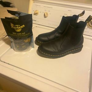 Like new. Comes with care kit